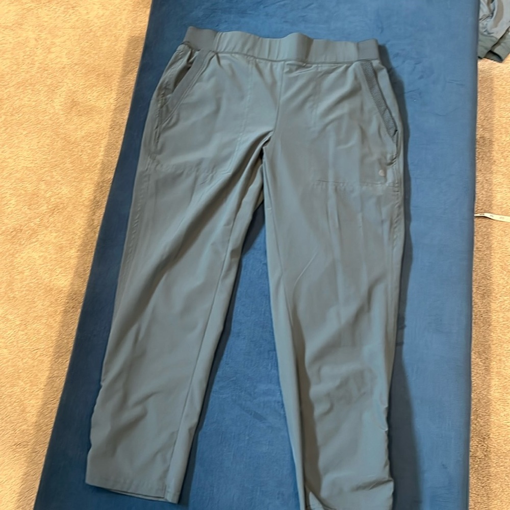 Size M Apana hiking pants in greenish-teal, excellent used condition